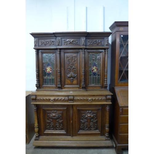 222 - A 19th Century French Henry II style carved oak and side cabinet