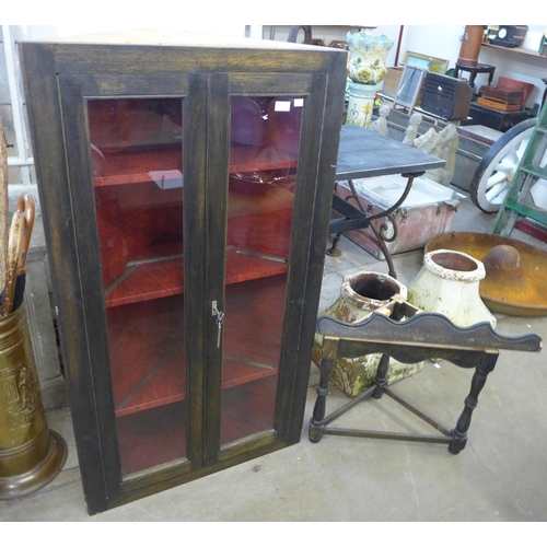 226 - An oak corner cabinet on stand