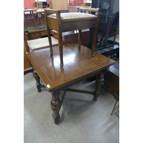 227 - An oak draw-leaf table and a mahogany piano stool