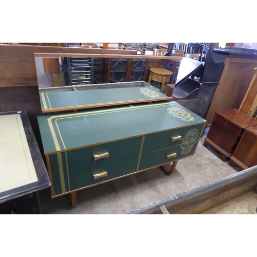 228 - An ebonised and leather topped pedestal desk, a swivel office chair, a painted teak dressing table a... 