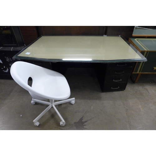 228 - An ebonised and leather topped pedestal desk, a swivel office chair, a painted teak dressing table a... 