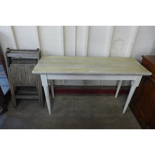 235 - A set of four wooden folding garden chairs and a painted beech kitchen table