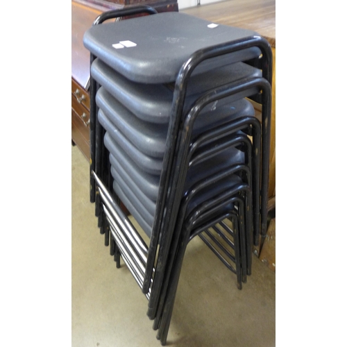 238 - A set of eight black metal framed stools