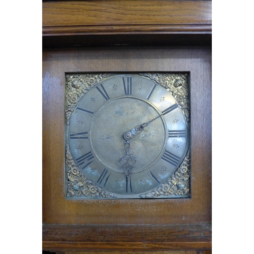 248 - A 19th Century oak 30-hour longcase clock, the brass dial signed Jos. Kember