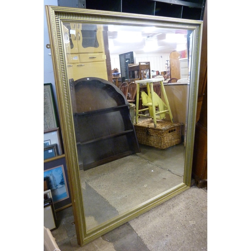 251 - A large gilt framed mirror