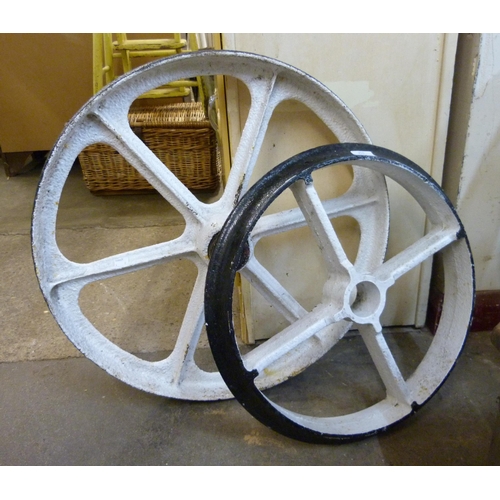 253 - Two cast iron wheels