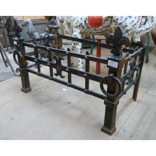 261 - A wrought iron fire grate frame