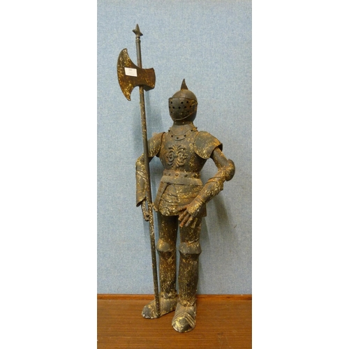 266 - A small metalwork figure of a medieval knight