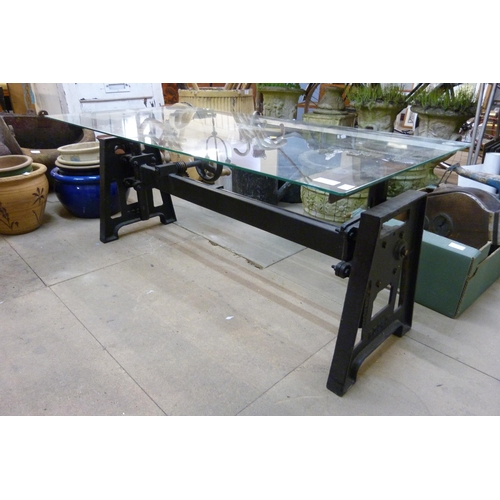 273 - An industrial style steel and glass topped coffee table