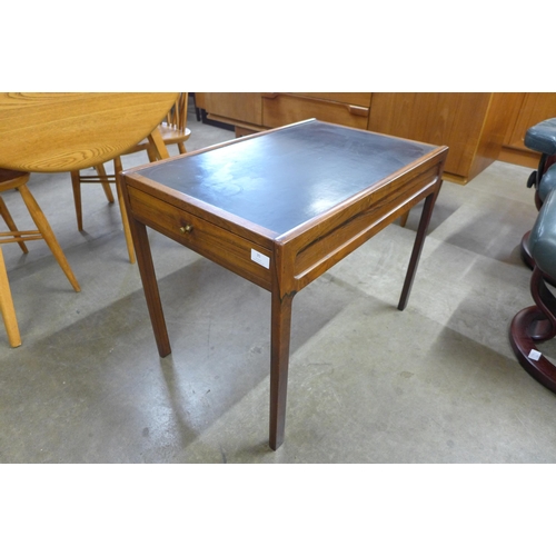 35 - A Danish rosewood and black laminated single drawer lamp table, CITES A10 no. 630306/01