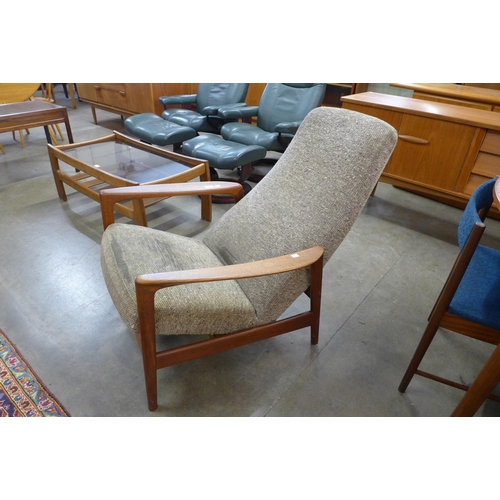 38 - A Swedish Dux teak armchair, designed by Folke Ohlsson. This lot is offered for sale as a work of ar... 