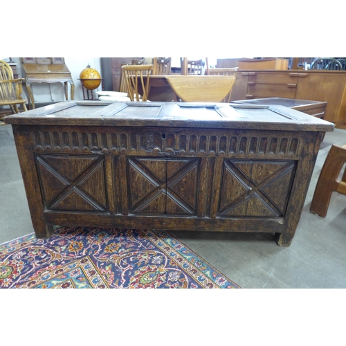 4 - A William III carved oak coffer