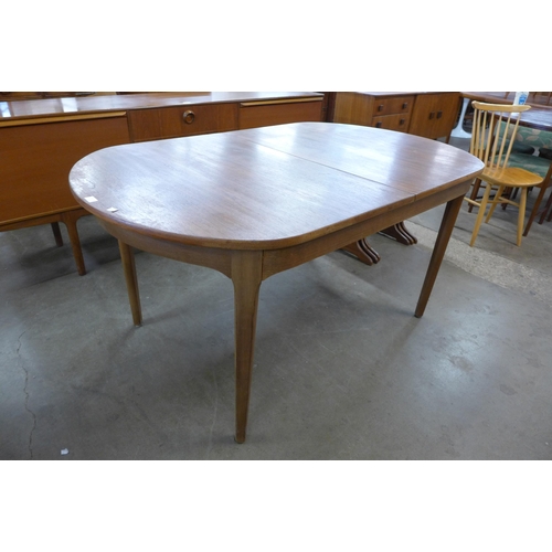 42 - A Nathan teak extending dining table