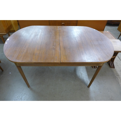 42 - A Nathan teak extending dining table