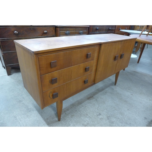 47 - A teak sideboard