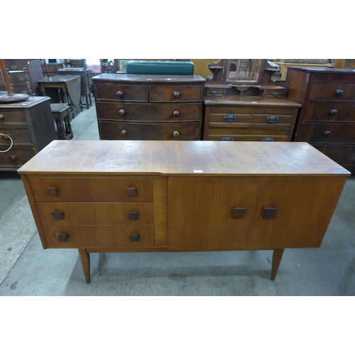 47 - A teak sideboard