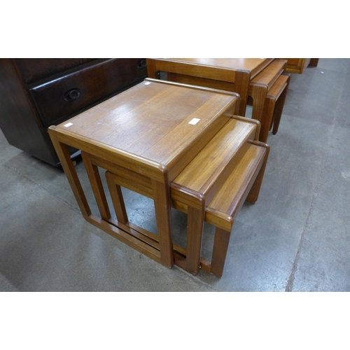 50 - A teak nest of tables