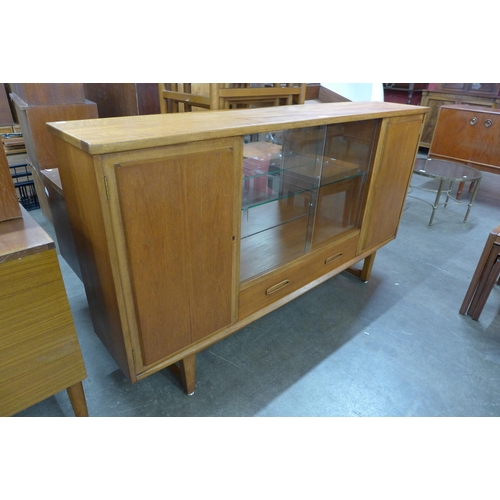 54 - A Jentique teak side cabinet