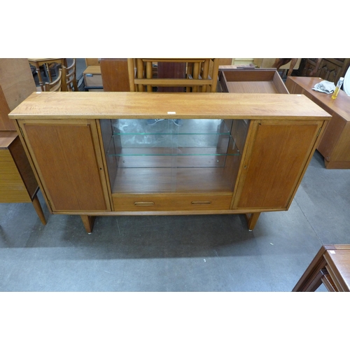 54 - A Jentique teak side cabinet