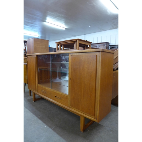 54 - A Jentique teak side cabinet