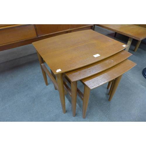 56 - A teak nest of tables