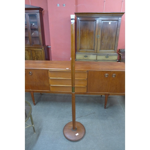 63 - A teak standard lamp