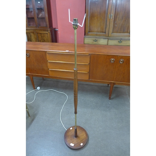 64 - A teak standard lamp