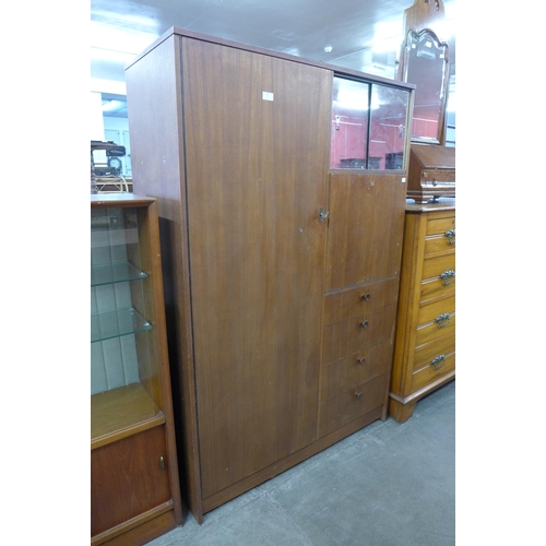 68 - An Avalon teak tallboy