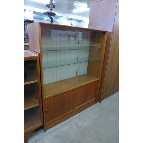 69 - A Herbert Gibbs teak display cabinet