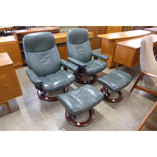 74 - A pair of Norwegian Ekorness Stressless beech and green leather revolving lounge chairs and matching... 