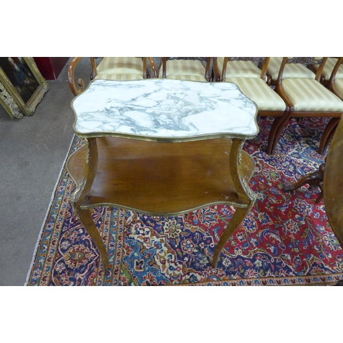 8 - A 19th Century French Louis XV style walnut, gilt metal and marble topped two tier etagere