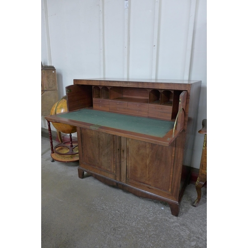 84 - A Regency inlaid mahogany fitted secretaire cupboard