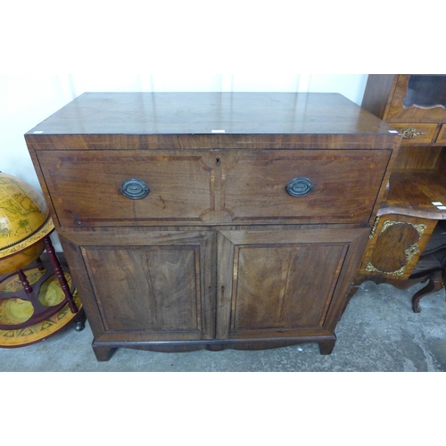 84 - A Regency inlaid mahogany fitted secretaire cupboard