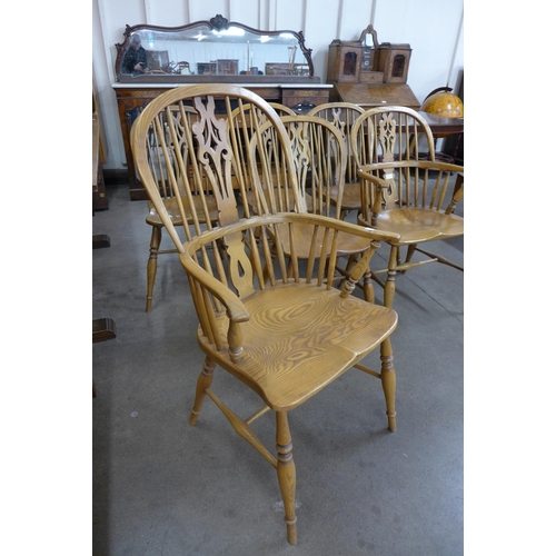 87 - A set of six Victorian style elm Windsor chairs