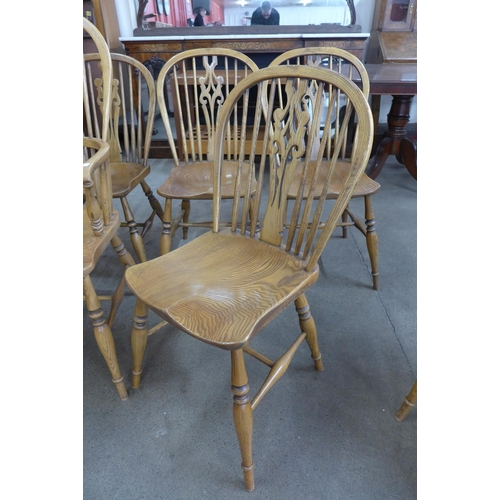 87 - A set of six Victorian style elm Windsor chairs