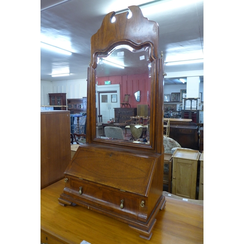 88 - A George II style inlaid walnut toilet mirror