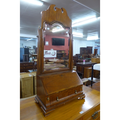 88 - A George II style inlaid walnut toilet mirror