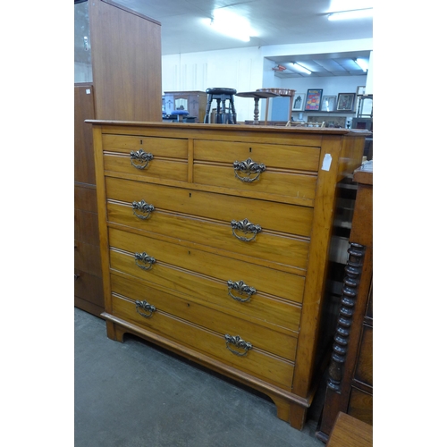 89 - An Edward VII satin birch chest of drawers