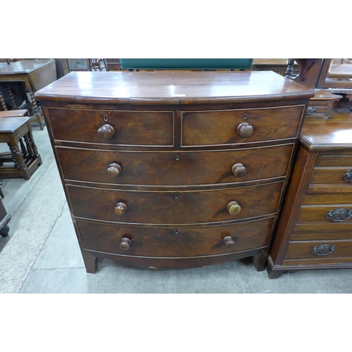 92 - A George III mahogany bow front chest of drawers