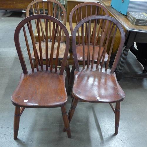 227A - A set of four elm and beech Windsor kitchen chairs