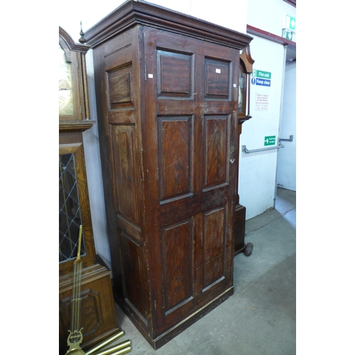 598 - A Victorian stained pine single door wardrobe