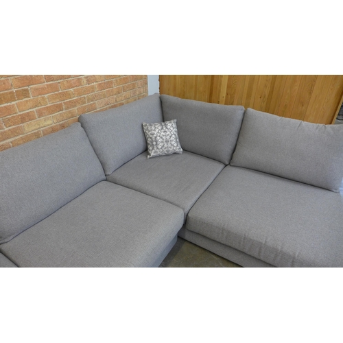 12 - A grey/mushroom upholstered RHF corner sofa (H=85cm x W=297cm x D (Return)=226cm)