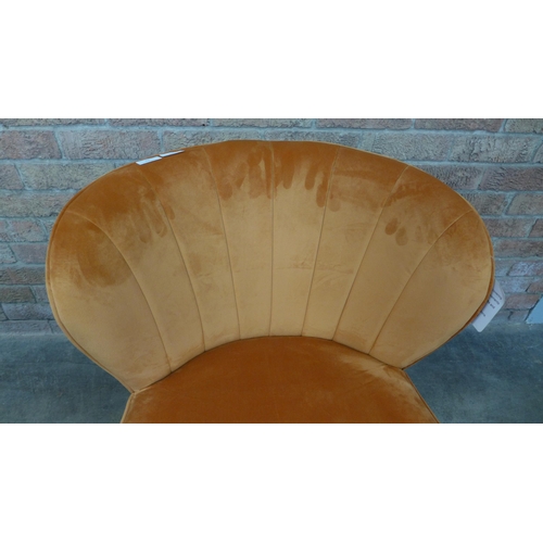 16 - A Lydel burnt orange upholstered shell back side chair (H=74cm x W=62cm x D=76cm)