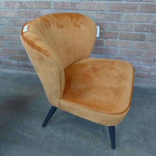 16 - A Lydel burnt orange upholstered shell back side chair (H=74cm x W=62cm x D=76cm)