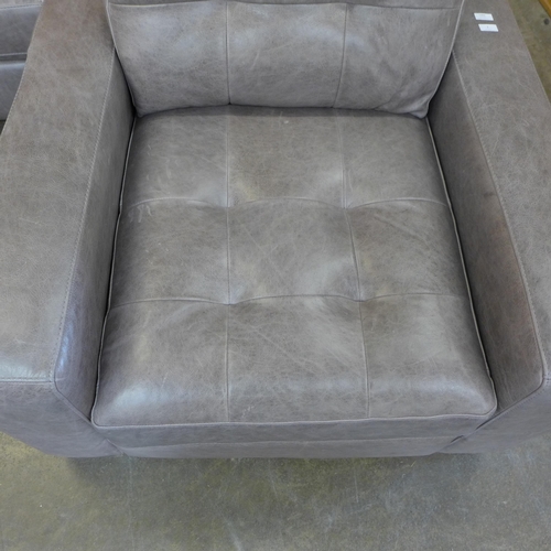 30 - A Montana fog leather pinched back large three seater sofa and armchair (Three Seater = H=90cm x W=2... 