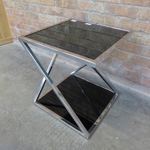 6 - A chrome and black glass lamp table (H=50cm x W=45cm x D=45cm)