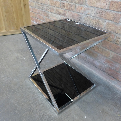 7 - A chrome and black glass lamp table (H=50cm x W=45cm x D=45cm)