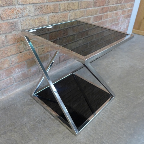 7 - A chrome and black glass lamp table (H=50cm x W=45cm x D=45cm)