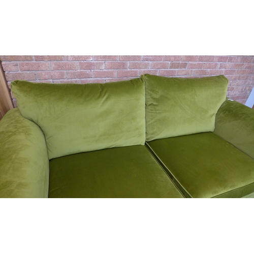 9 - A moss green velvet four and 2.5 seater sofa (Four Seater = H=100cm x W=237cm x D=106cm, 2.5 Seater ... 