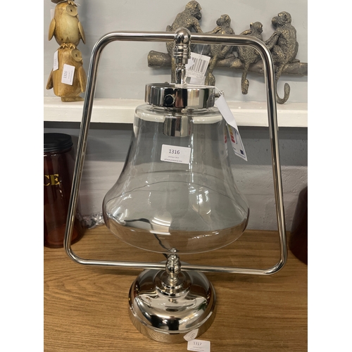 1316 - A glass and chrome table lamp